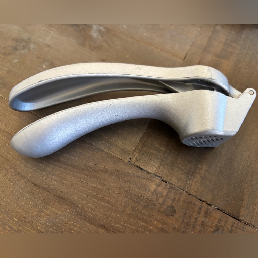 Preowned Pampered Chef Garlic Press